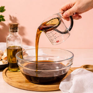 Chefiora™ 4-in-1 Adjustable Measuring Cup – Multi-Functional Kitchen Measuring Cube with Scraper Base